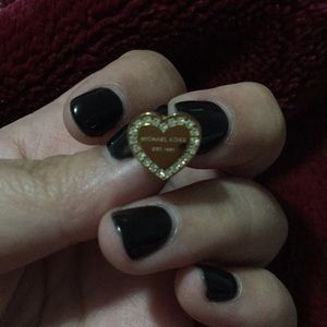 Gold heart shaped Michael Kors earrings